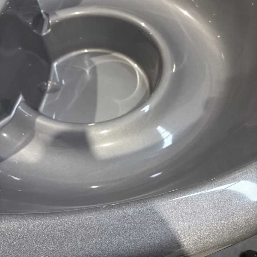 Close-up of a hot tub grey insert with a reflective surface